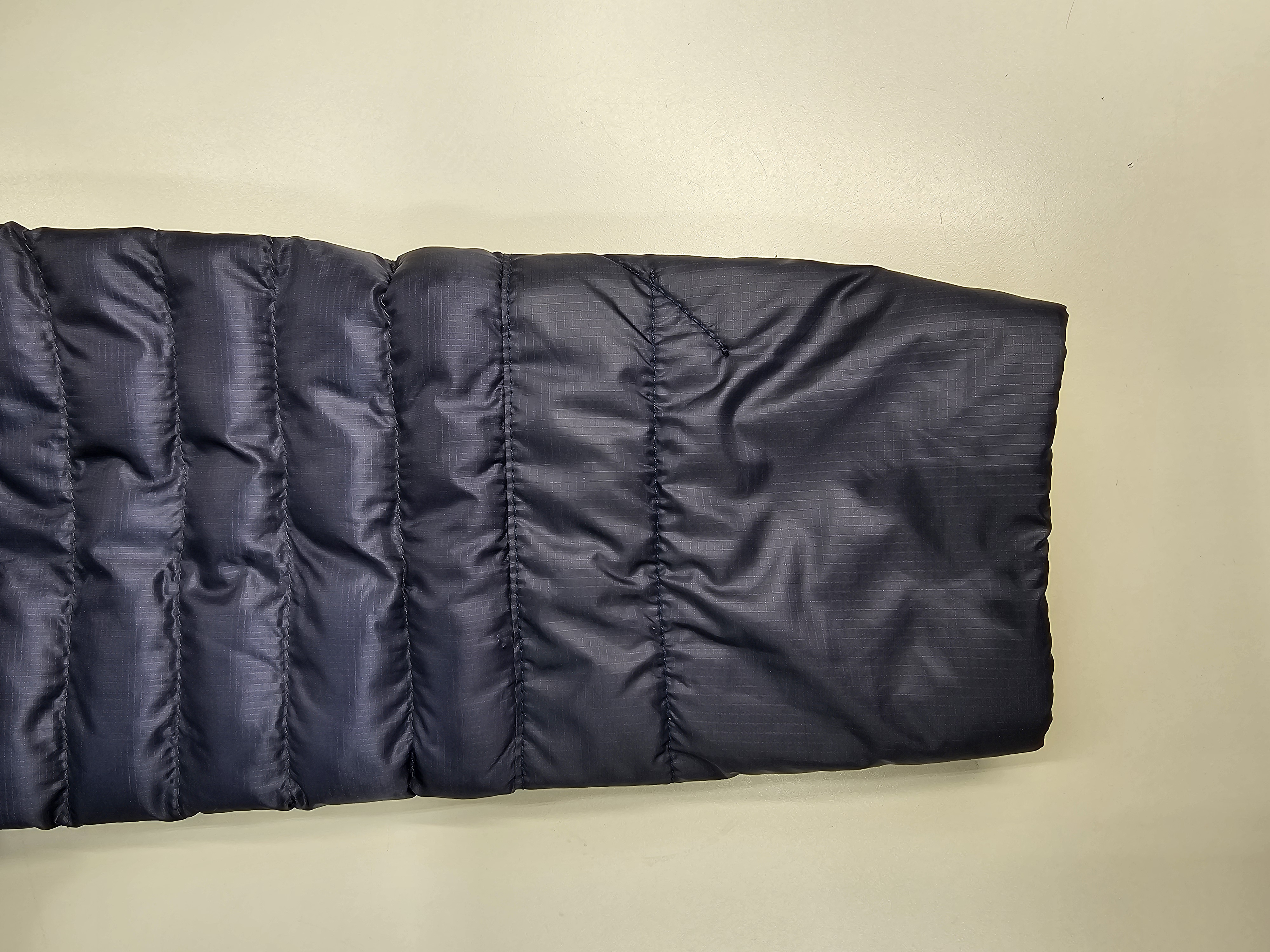 blue jacket sleeve repaired